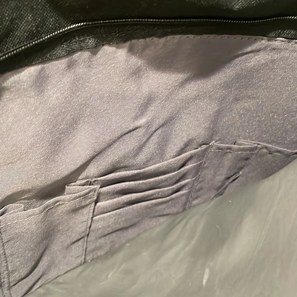 Black and grey canvas messenger bag. NWT